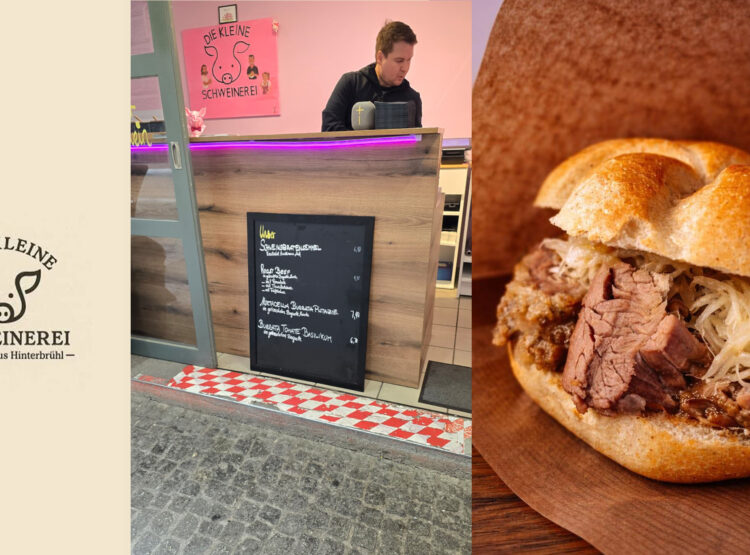 Ein Mann steht hinter einem Tresen, auf dem eine Speisekarte mit Kreide und ein Sandwich mit Fleisch und Sauerkraut abgebildet sind.